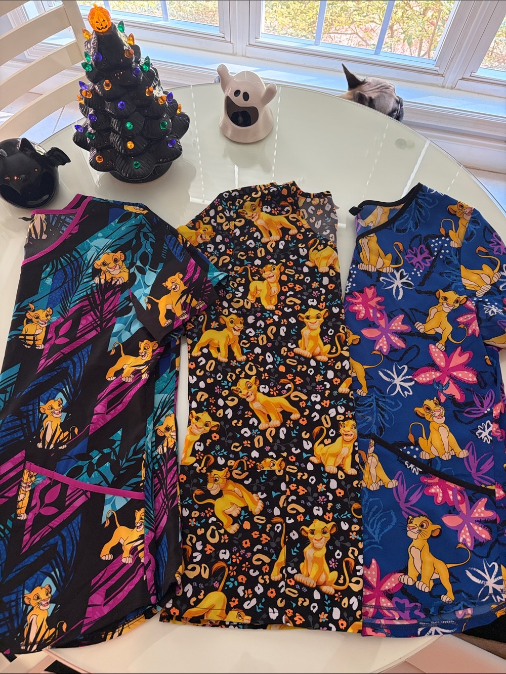 Lot of 3 women’s Disney lion King scrub tops. Medium